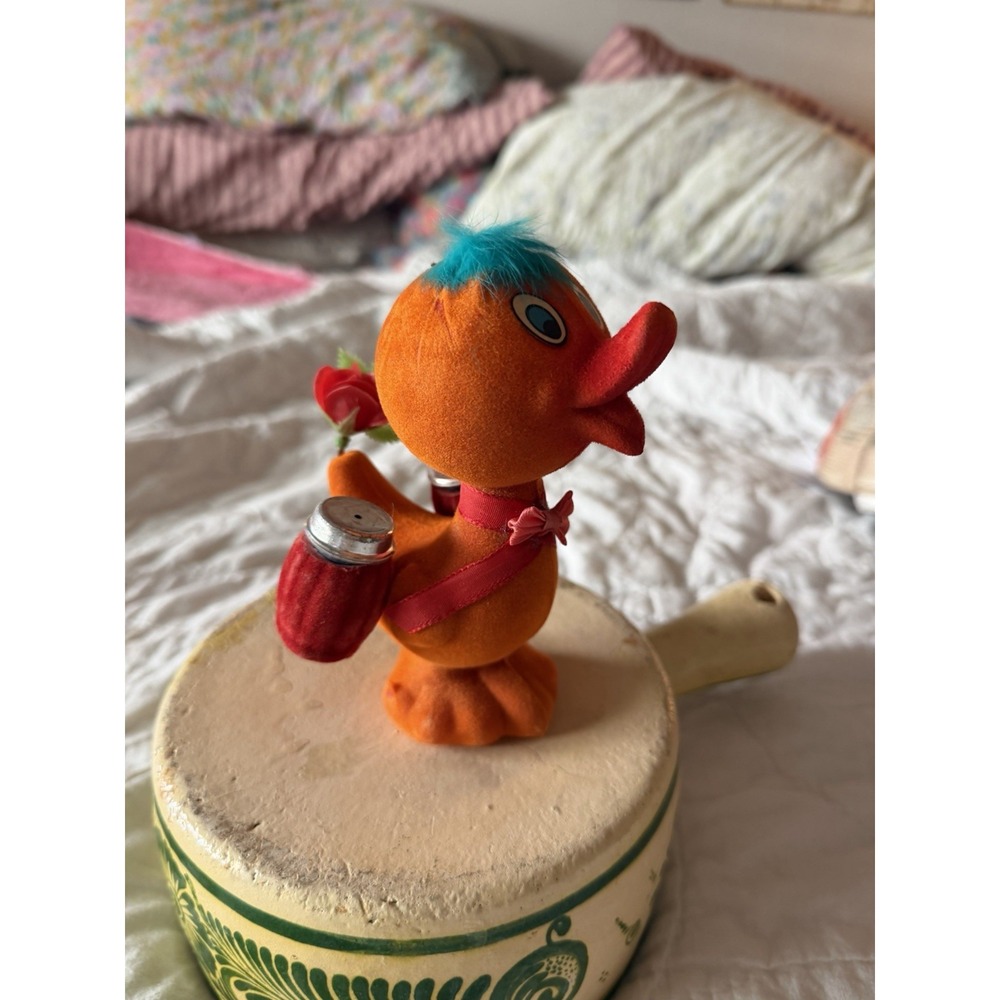 vintage orange duck is a flocked paper mache salt and pepper hMade in Hong Kong